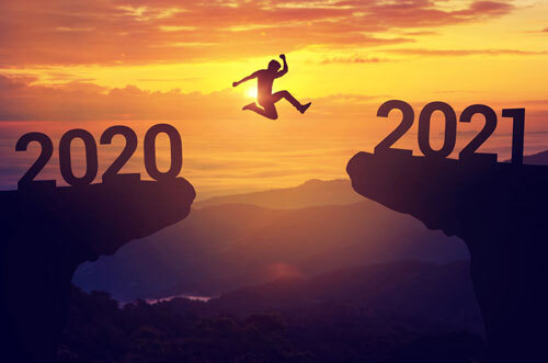 man leaping from 2020 to 2021